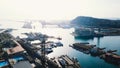 Aerial view of amazing boats at sunset. Stock. Top view from drone of harbor with yacht, motorboat and sailboat Royalty Free Stock Photo