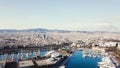 Aerial view of amazing boats at sunset. Stock. Top view from drone of harbor with yacht, motorboat and sailboat Royalty Free Stock Photo