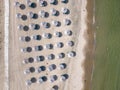 Aerial view of an amazing empty sand beach with straw beach umbrellas and turquoise clear water. Bulgaria Black Sea Royalty Free Stock Photo