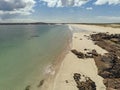 Aerial view on amazing Gurteen bay and beach, county Galway, Ireland. Long stretch of sandy beach and beautiful ocean. Irish