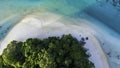 Aerial view of Amazing island with  white sand beach green tree forest and blue sea water background Royalty Free Stock Photo