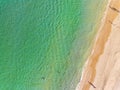 Aerial view Amazing sandy beach and small waves Beautiful tropical sea in the morning summer season image by Aerial view drone Royalty Free Stock Photo