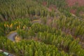 Aerial view of an amazing winding curved road through the mountains in autumn fall colors landscape, motorway in Romania Royalty Free Stock Photo