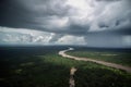 aerial view of the amazonas, with thunderstorm brewing in the distance