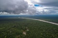 aerial view of the amazonas, with thunderstorm brewing in the distance