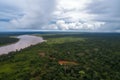 aerial view of the amazonas, with thunderstorm brewing in the distance