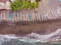 Aerial view of Amed beach in Bali, Indonesia. Traditional fishing boats called jukung on the black sand beach and Mount Royalty Free Stock Photo