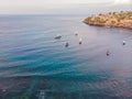 Aerial view of Amed beach in Bali, Indonesia. Traditional fishing boats called jukung on the black sand beach and Mount Royalty Free Stock Photo