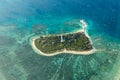 Aerial view of a lighthouse on a tropical island