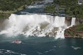 Aerial view of American and Bridal Veil Falls including Hornblower Boat sailing on Niagara River, Canada and USA natural border Royalty Free Stock Photo
