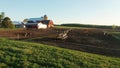 Aerial view of american countryside landscape. Farm, red barn, cows. Rural scenery, farmland. Sunny morning, spring summer season Royalty Free Stock Photo