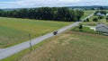 Amish Farm Land and a Horse and Buggy Going Down the Road Royalty Free Stock Photo