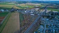 Aerial View of an Amish Mud Sale with Lots of Buggies and Farm Equipment Royalty Free Stock Photo