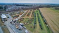 Aerial View of an Amish Mud Sale with Lots of Buggies and Farm Equipment Royalty Free Stock Photo