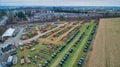 Aerial View of an Amish Mud Sale with Lots of Buggies and Farm Equipment Royalty Free Stock Photo