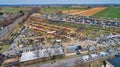 Aerial View of an Amish Mud Sale with Lots of Buggies and Farm Equipment Royalty Free Stock Photo