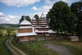 Aerial view on ancient wooden Church of Synaxis of the Holy Mother of God in Matkiv, Lviv region, Ukraine from drone Royalty Free Stock Photo