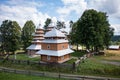 Aerial view on ancient wooden Church of Synaxis of the Holy Mother of God in Matkiv, Lviv region, Ukraine from drone Royalty Free Stock Photo