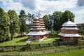 Aerial view on ancient wooden Church of Synaxis of the Holy Mother of God in Matkiv, Lviv region, Ukraine from drone Royalty Free Stock Photo