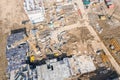 Aerial view of apartment building under construction and yellow tower crane Royalty Free Stock Photo