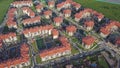 Aerial view apartment buildings complex and residential houses neighborhood. Clip. Top view of the modern luxery