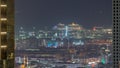 Aerial view of apartment houses and villas in Dubai city near downtown night timelapse. Royalty Free Stock Photo