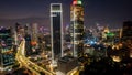Aerial view of Architecture details Modern Building Glass facade Business background at night. Jakarta, Indonesia, September 23,