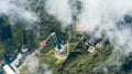 Aerial view architecture of the temple and pagoda on the top of the Fansipan mountain with a beautiful natural scenic of Sapa, Lao Royalty Free Stock Photo