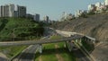 Aerial view of Armendariz downhill, Miraflores town and the Costa Verde reef in Lima, Peru.