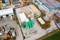 Aerial view of asphalt plant, concrete mixing plant and large piles of sand with crushed stone Royalty Free Stock Photo