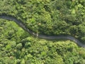 Aerial view of asphalt road in tropical forest.Winding road from the high mountain pass.Top view forest texture landscape Royalty Free Stock Photo