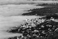 An aerial view of Assisi town and St.Francis church over a sea of fog Royalty Free Stock Photo