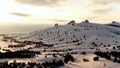 Aerial view of the astrophysical observatory in wintertime in snowy forest, Crimea. Shot. Beautiful landscape of snowy