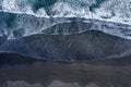 Aerial view of Atlantic ocean waves washing black sandy beach Royalty Free Stock Photo