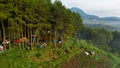 Aerial view of The atmosphere around the tent site of the Datar Pinus park. Lots of traveller are Camping at Datar Pinus