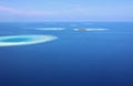 Aerial view of atolls in the Maldives