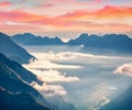 Aerial view of Auronzo town in the morning mist. Great sunrise in Dolomite Alps, Italy, Europe Royalty Free Stock Photo