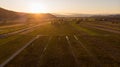 Aerial view of autumn fields at sunset.