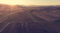 Aerial view of autumn fields at sunset.