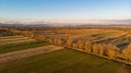 Aerial view of autumn fields at sunset.