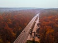 aerial view of autumn highway in forest Royalty Free Stock Photo