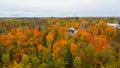 Aerial View of Autumn Landscape View of the Autumn Bright Multi-colored Trees, Green, Orange and Reddish Tint. Royalty Free Stock Photo