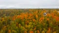 Aerial View of Autumn Landscape View of the Autumn Bright Multi-colored Trees, Green, Orange and Reddish Tint. Royalty Free Stock Photo