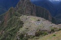 An aerial view of the back section of Machu Picchu with Huayna Picchu towering in the background in Peru