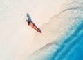 Aerial view of the back of sexy woman on the sandy beach Royalty Free Stock Photo