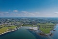 Aerial view on Ballyloughane Strand in Galway city, Ireland. High tide. Blue cloudy sky and ocean water. Popular area with amazing Royalty Free Stock Photo