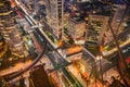 Aerial view of Bangkok city at night in Thailand. cityscape of Modern buildings, urban architecture and road traffic Royalty Free Stock Photo