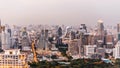 Aerial view of Bangkok modern office buildings, condominium in Bangkok city downtown at the dusk. With city and traffic lights Royalty Free Stock Photo