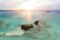 Aerial view Banyak Islands Sumatra tropical archipelago Indonesia, coral reef dramatic sky sunset. Travel destination, diving