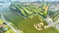 Aerial view of Bao Loc cityscape at morning with misty sky in Vietnam highlands